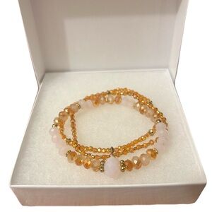 Three Elegant Pink and Orange Crystal Beaded Stacking Bracelets With Gold Accent